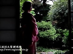 Curled Asian Beauty Bound by Rope